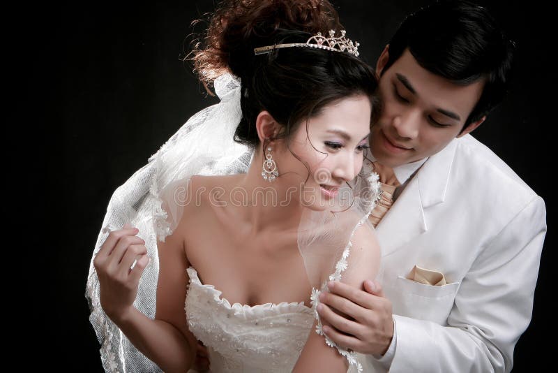 Young bride and groom in erotic emotio