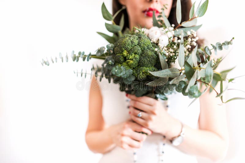 Young bride with modern foodie bouquet stock photography Young bride with modern foodie bouquet stock photography