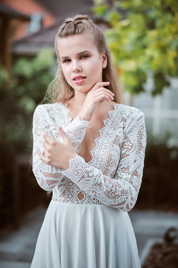 Young Bride Wearing Wedding Dress and Posing Outside Stock Image ...