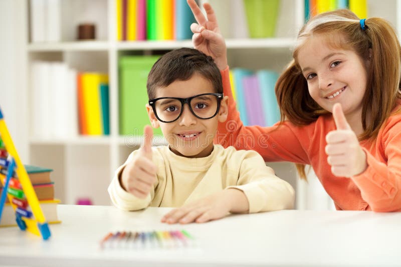 Young Brother and Sister Learning at Home,funny Concept Stock Image