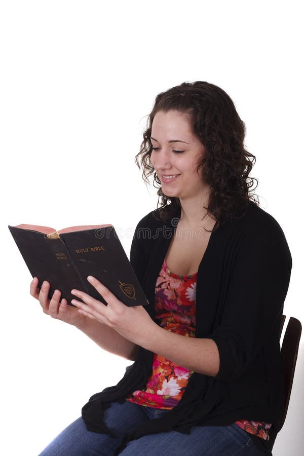 Young Brunette on Stool Reading Bible Smiling