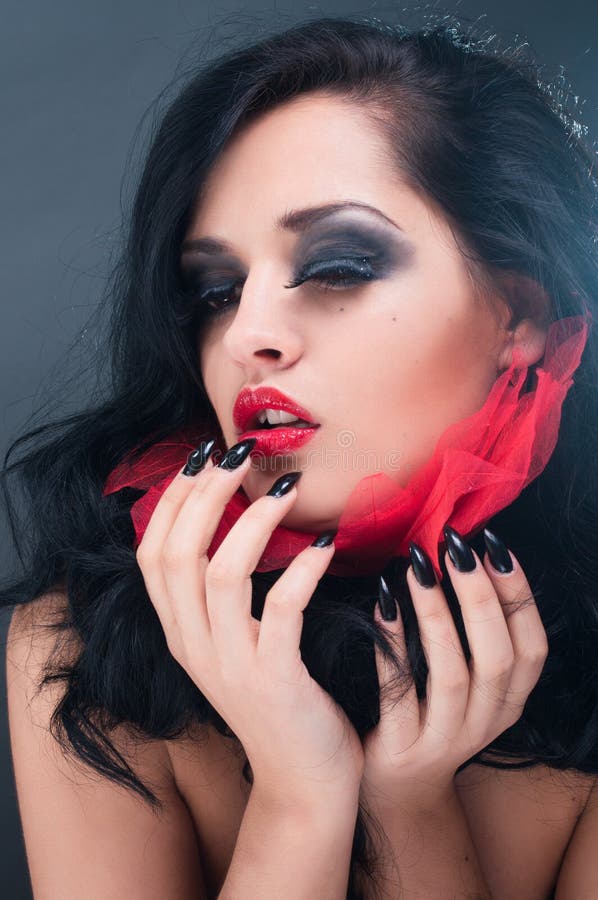 Young brunette woman with red collar