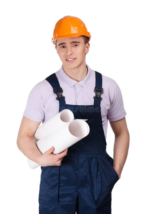 Young builder in hard hat with blueprints