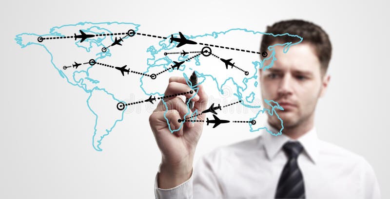 Young business man drawing an airplane routes royalty free stock photos