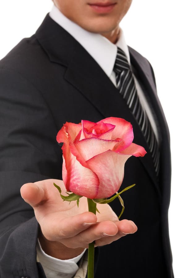 Young business man hold rose