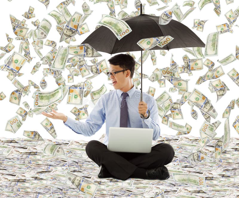 Young business man holding a umbrella with dollar rain royalty free stock photo Young business man holding a umbrella with dollar rain royalty free stock photo