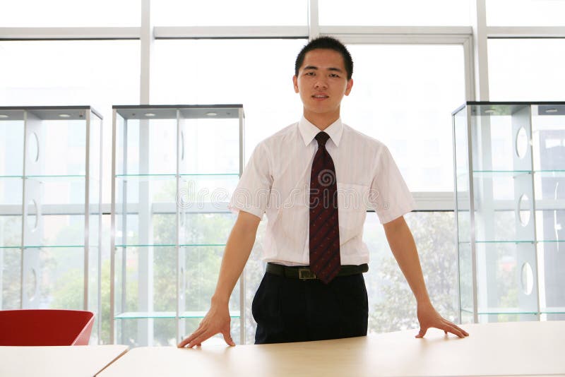 Young business man in office