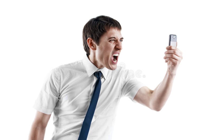 Young business man screaming in his cellphone