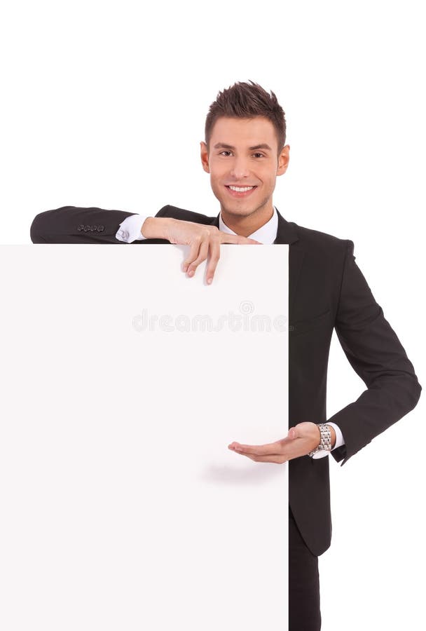 Young business man showing board