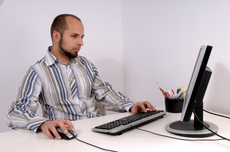 Young business man working on computer