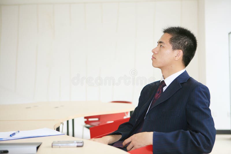 Young business man working in office