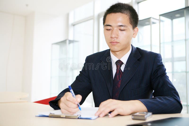 Young business man working in office