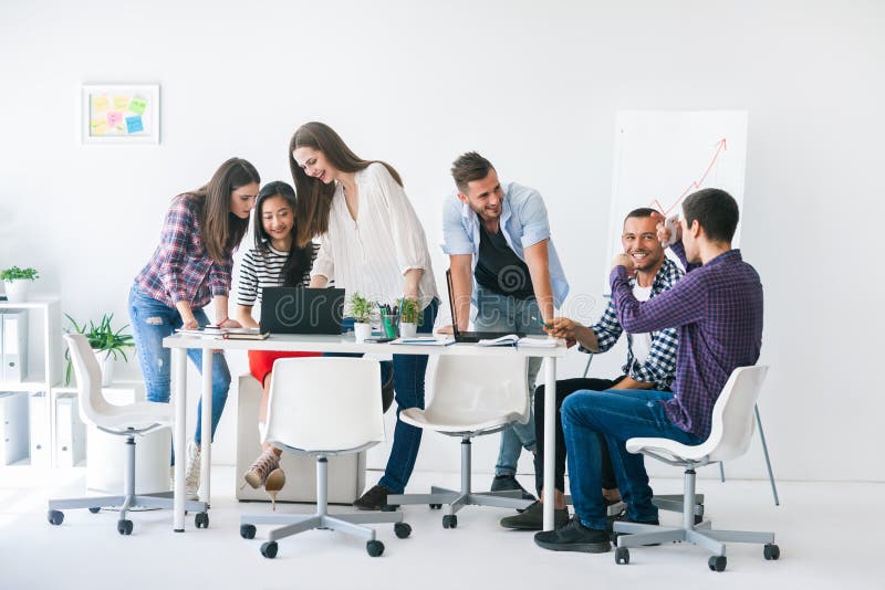 Young business people or students work in team indoor stock images