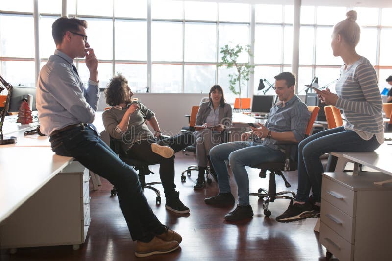 Young Business Team At A Meeting at modern office building. Group, consulting.