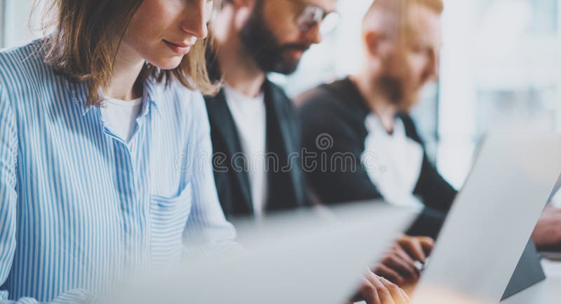 Young business team working together in meeting room at office. Coworkers brainstorming process concept. stock images Young business team working together in meeting room at office. Coworkers brainstorming process concept. stock images