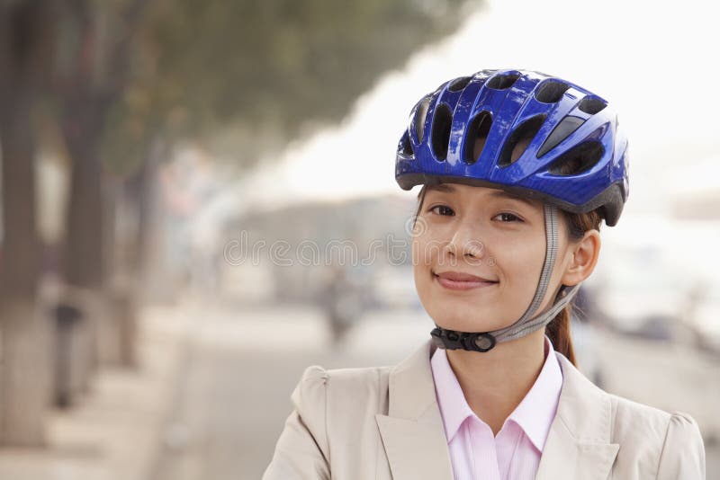 Young Business Woman Commuting with a Bicycle, Beijing, China Stock ...