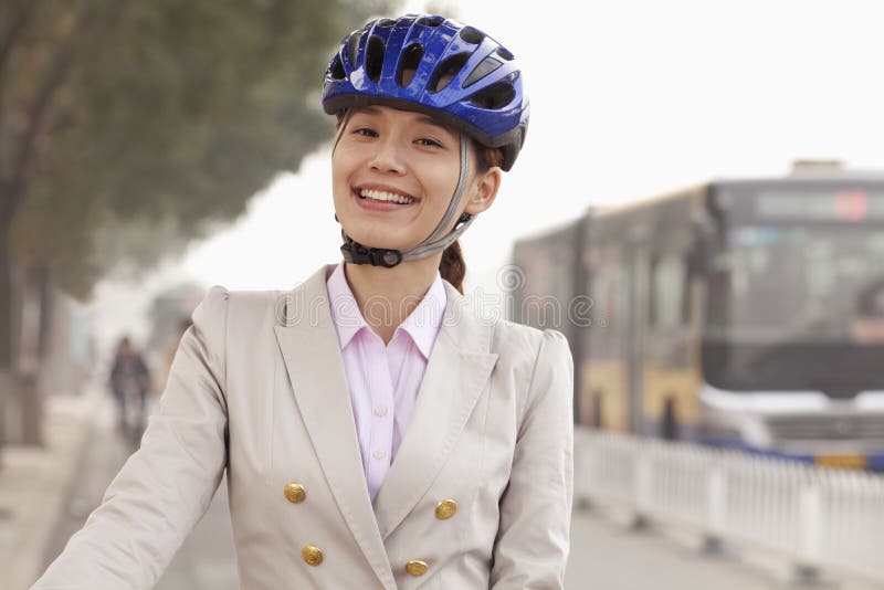 Young Business Woman Commuting with a Bicycle, Beijing, China Stock ...