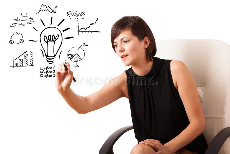 Young business woman drawing light bulb with various diagrams an