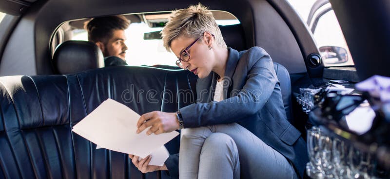 Young business woman and her chauffeur