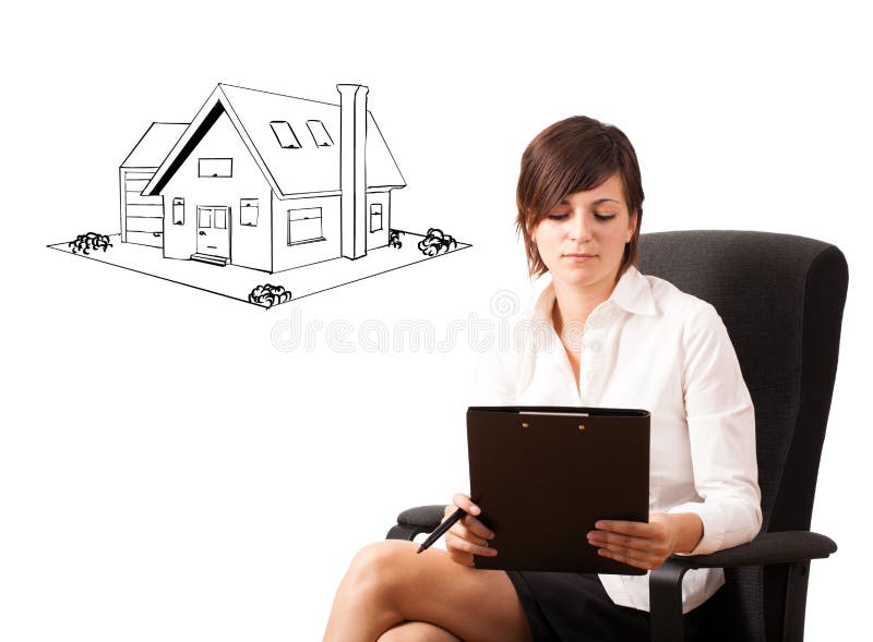 Young business woman presenting a house on whiteboard royalty free stock photos Young business woman presenting a house on whiteboard royalty free stock photos