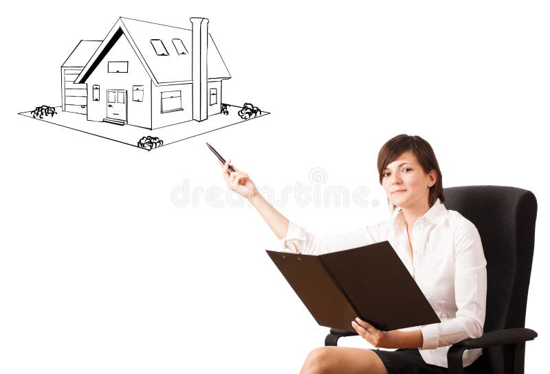 Young business woman presenting a house on whiteboard stock image Young business woman presenting a house on whiteboard stock image