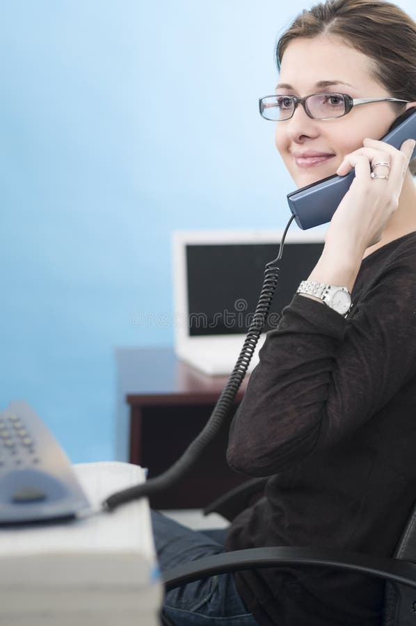 Young business woman talking on the phone