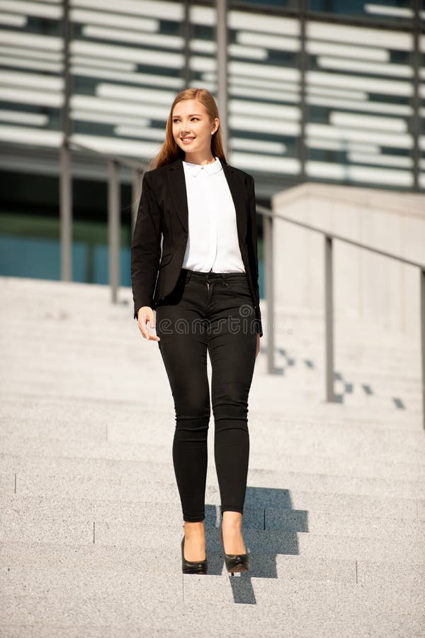 Young Business Woman Walk on Stairs Leaving Office Building Stock Image ...