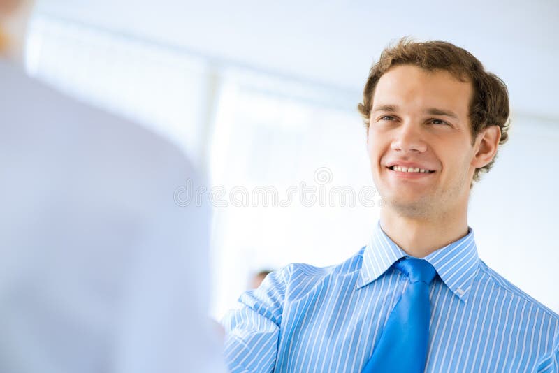 Young businessman doing interviews royalty free stock photo