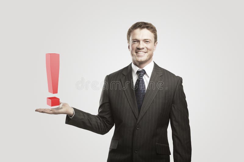Young businessman with an exclamation mark