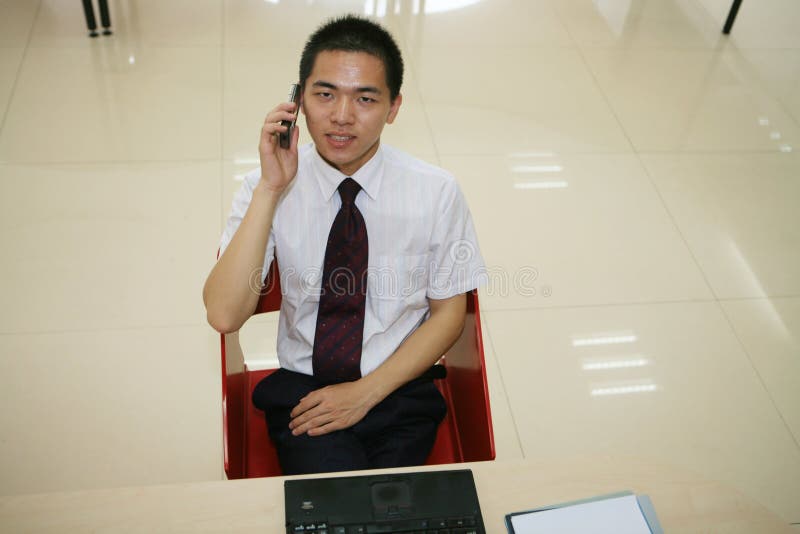 Young businessman in his office