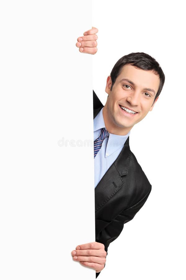 Young businessman holding a blank billboard