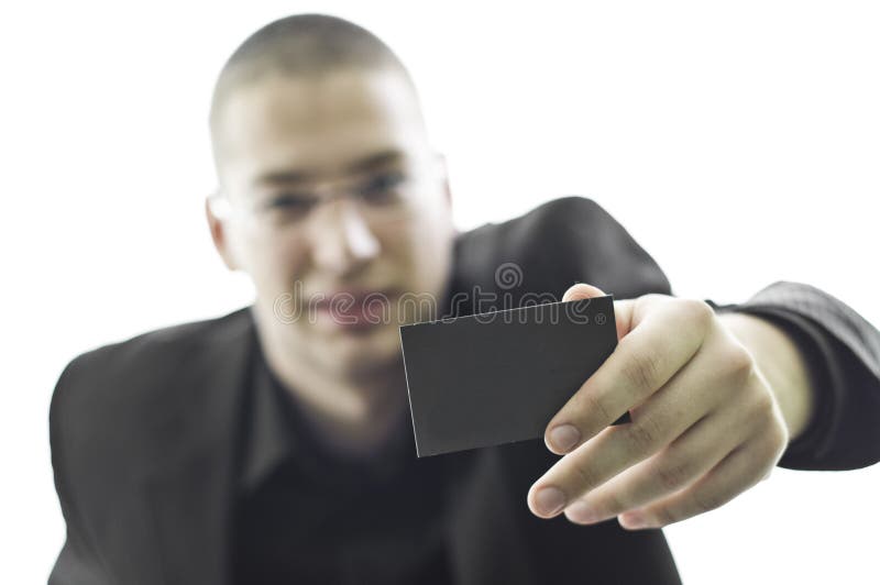 Young businessman holding a business card