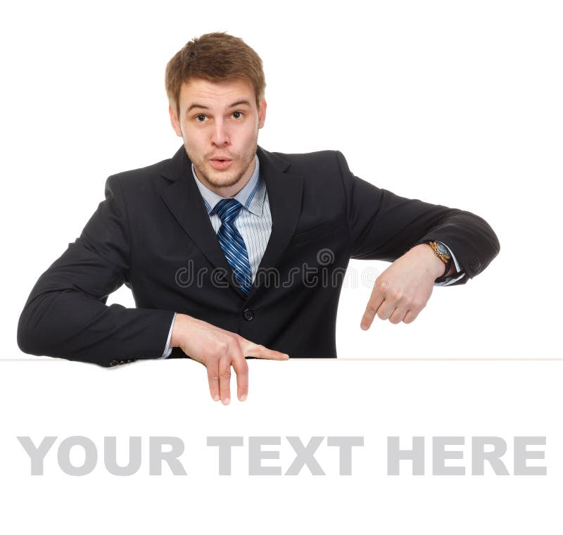 Young businessman holding a whiteboard. Concept - a demonstration of achievements in business, graphic ads.