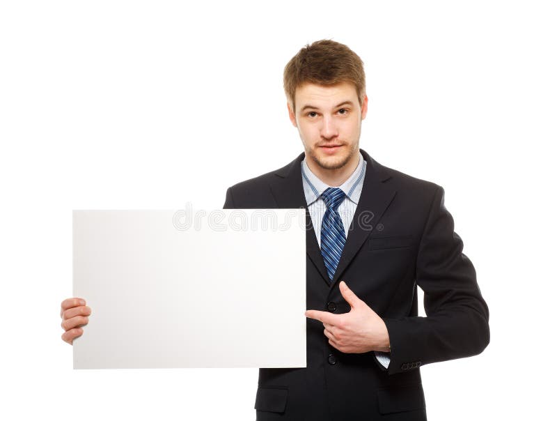 Young businessman holding a whiteboard. Concept - a demonstration of achievements in business, graphic ads.