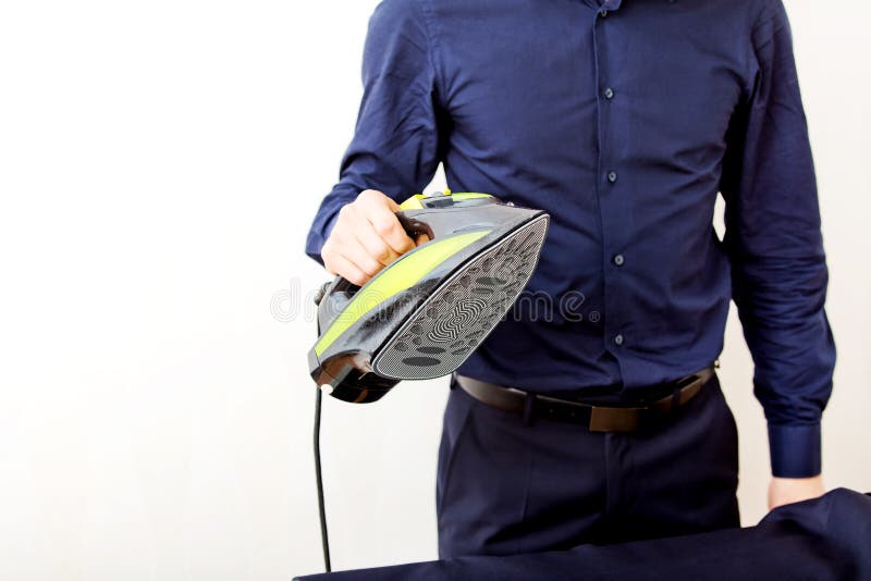 Young Businessman Ironing His Jacket Stock Image Image of hard