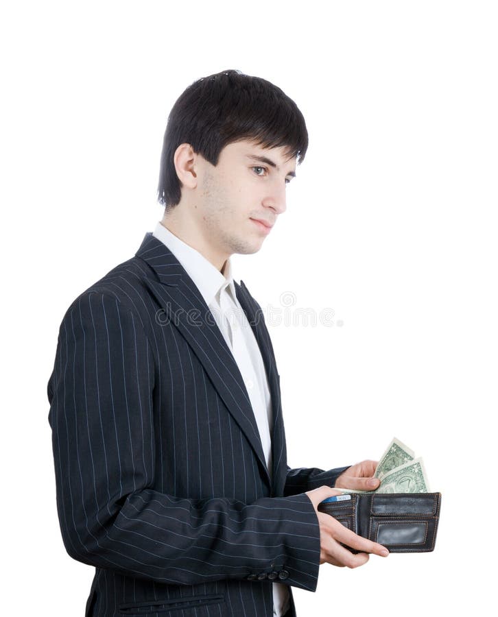 The young businessman with money (isolated)