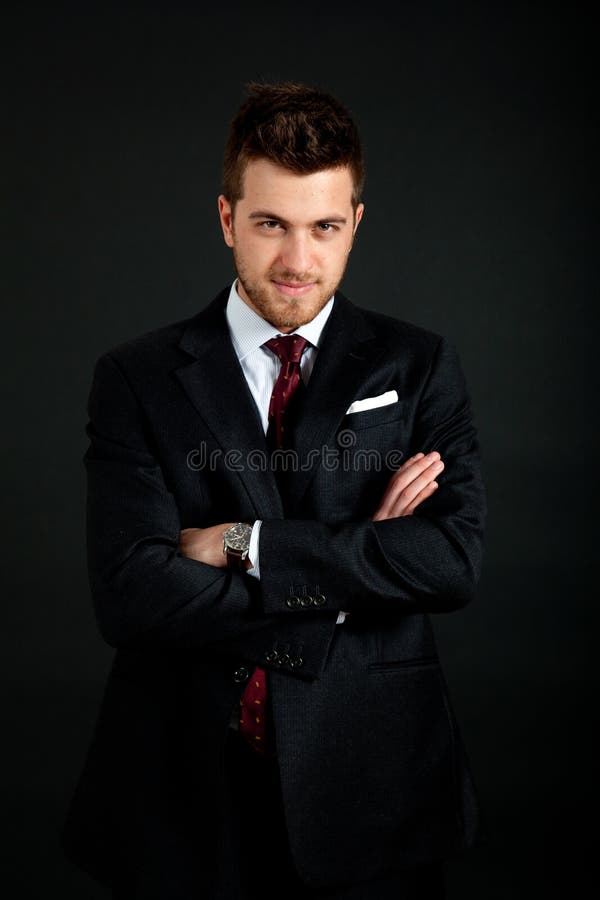 Young Businessman Portrait on a Dark Background Stock Photo - Image of ...