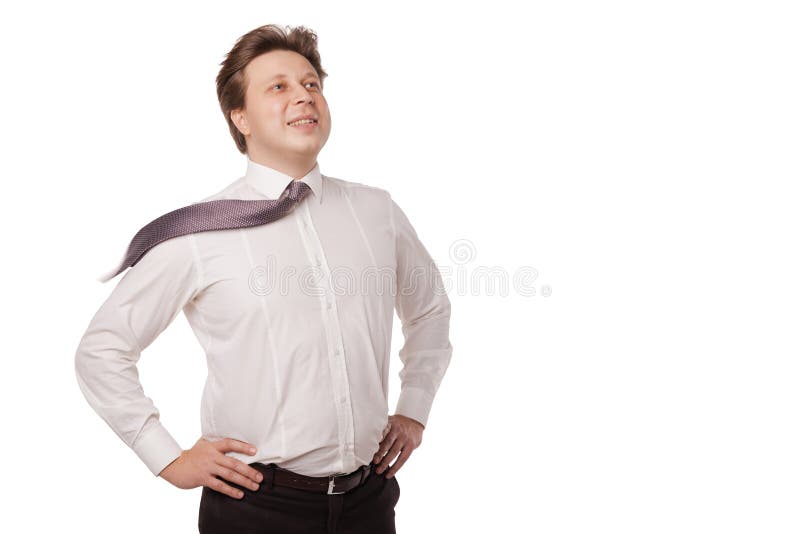 Young businessman smiling with blowing necktie