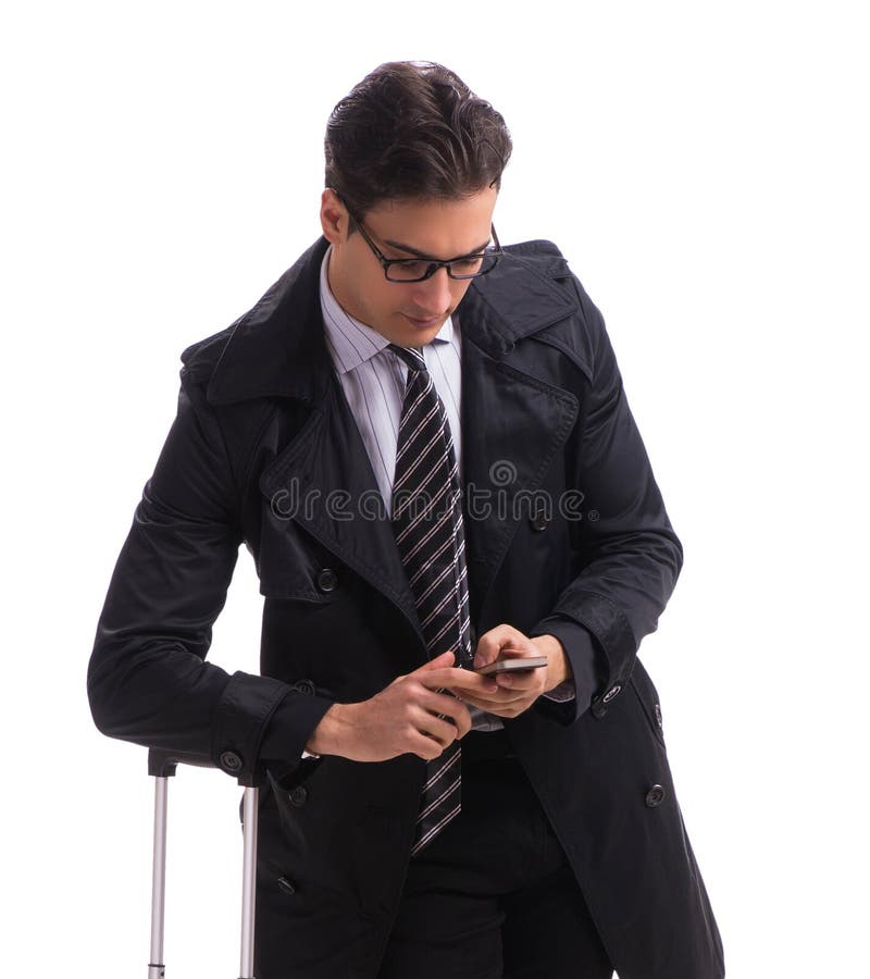 Young businessman with suitcase ready for business trip on white royalty free stock photos Young businessman with suitcase ready for business trip on white royalty free stock photos