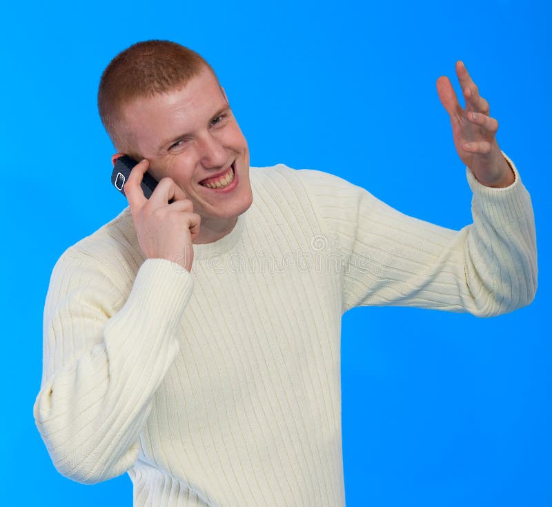 Young businessman talking on cell phone