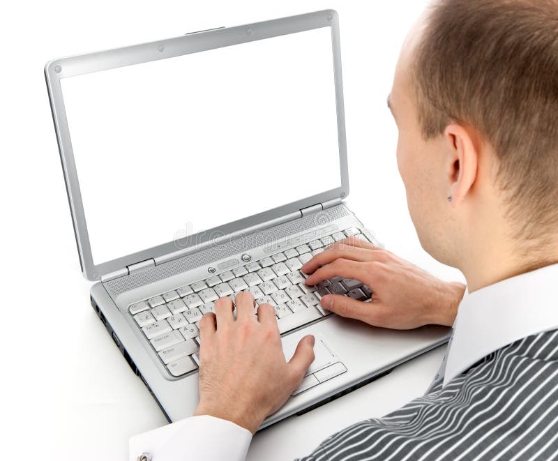 Young businessman working of a laptop