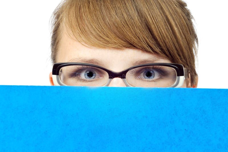 Young businesswoman with blue folder