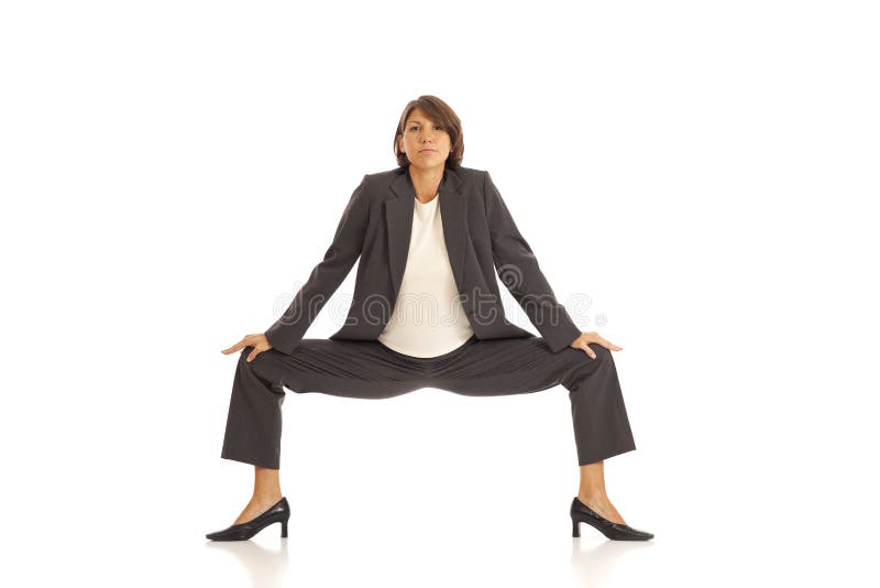 Young businesswoman doing yoga