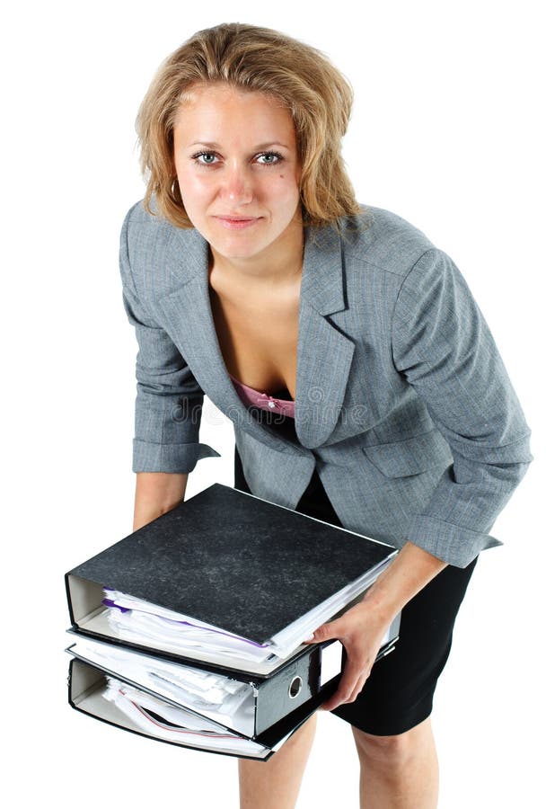 Young businesswoman lifting notepads stock photo