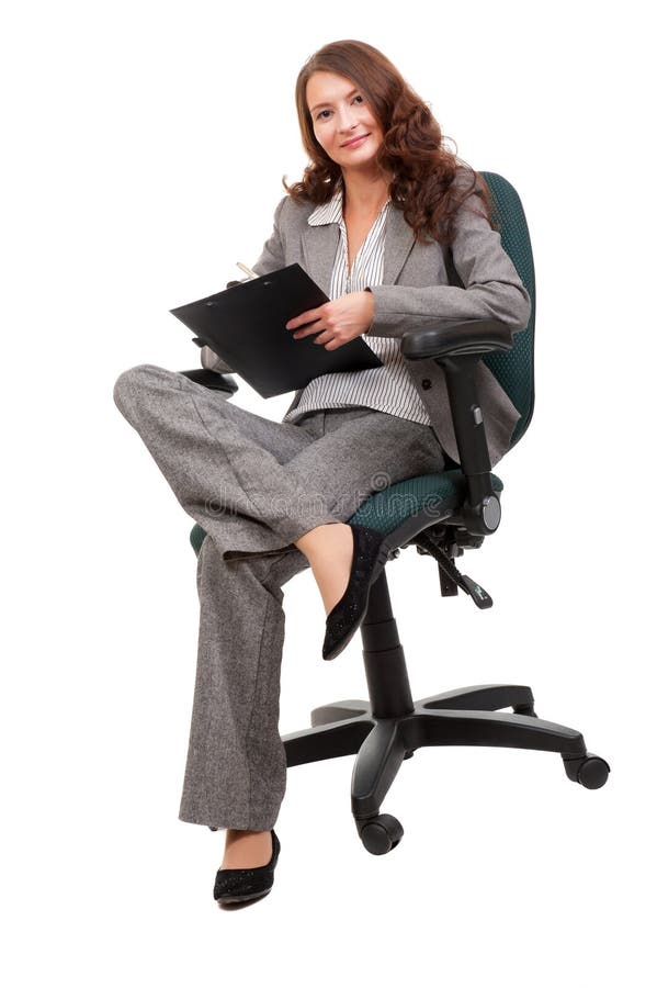 Young businesswoman siiting on office chair