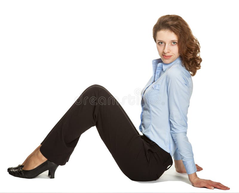 Young businesswoman sitting on the floor