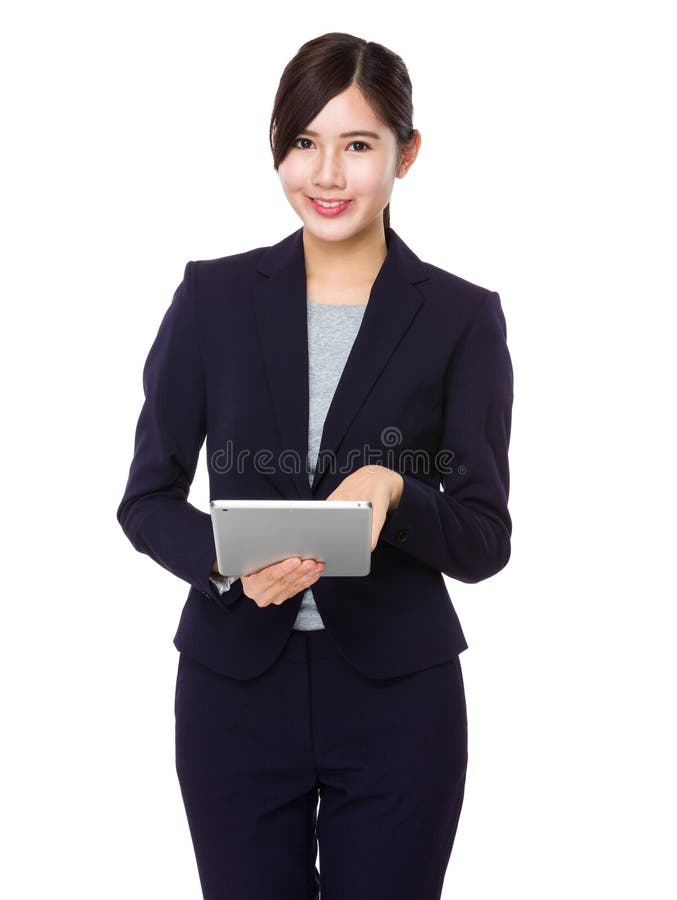 Young businesswoman use of the digital tablet