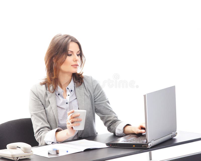 A young businesswoman working on the laptop stock photos