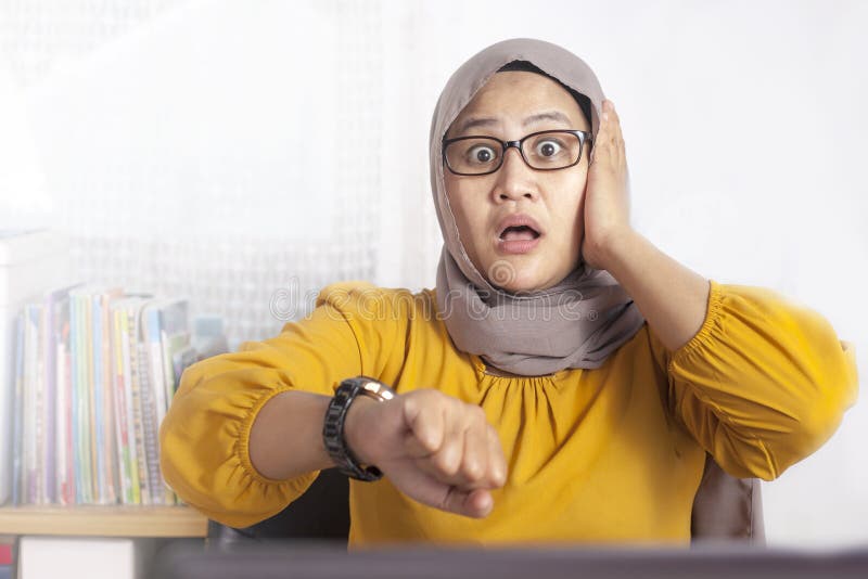 Young Businesswoman Worried by Time, Work Deadline Stress stock photography Young Businesswoman Worried by Time, Work Deadline Stress stock photography