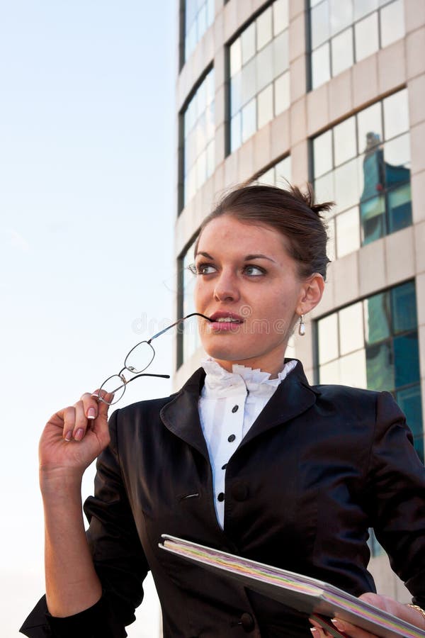 Young businesswomen with diary in her hands